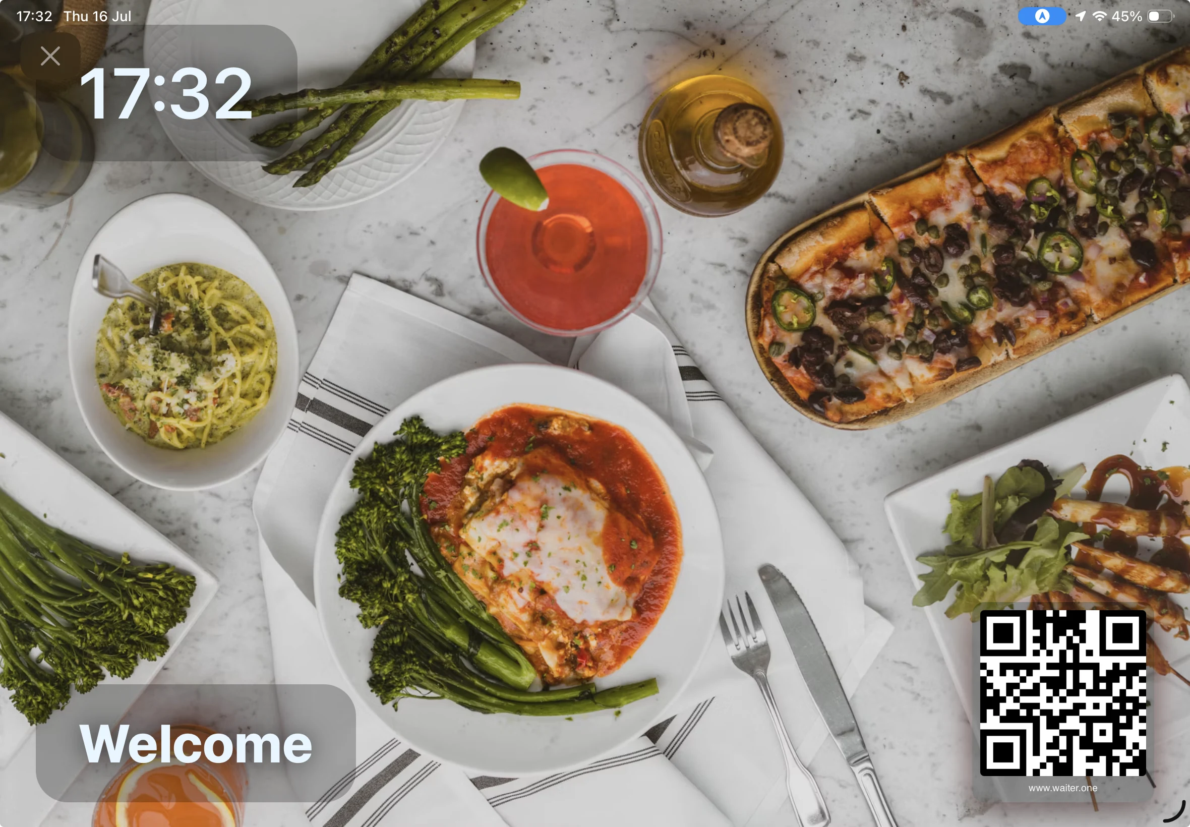 WaiterOne Customer Display with a welcome message and menu QR code